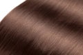 Closeup on luxurious glossy brown hair