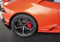 Closeup of the luxurious orange sports car Lamborghini Huracan EVO