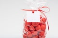 Closeup of luxury bag of sugar strawberries with red ribbon Royalty Free Stock Photo