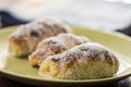 Closeup macro baked rolls with coconut served on the plate