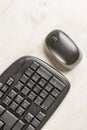 Closeup macro black pc keyboard with black wireless mouse Royalty Free Stock Photo