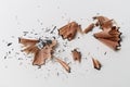 Closeup macro detail of pencil sharpener wooden swirl shavings on white - Concept of school education, learning, student, studying