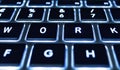 Closeup macro, laptop and keyboard with shine, backlit or technology for email communication, coding or iot. Pc Royalty Free Stock Photo