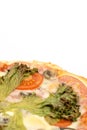 Closeup macro pizza slice with green lettuce and tomato Royalty Free Stock Photo