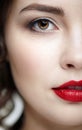 Closeup macro portrait of female face. Human woman half-face  with day beauty makeup Royalty Free Stock Photo