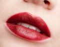 Closeup macro portrait of female red smiling lips with day beauty makeup Royalty Free Stock Photo