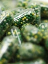 closeup macro shot of edible capsules with pills Royalty Free Stock Photo