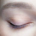 Closeup macro shot of human female eye. Woman with natural face beauty makeup Royalty Free Stock Photo