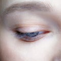 Closeup macro shot of human female eye. Woman with natural face beauty makeup Royalty Free Stock Photo