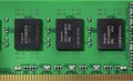 Closeup macro of SK hynix DRAM memory chips on green RAM PCB with gold edge contacts, computer DDR SDRAM module detail, Royalty Free Stock Photo