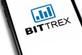 Closeup Bittrex cryptocurrency exchange logo on the screen smartphone