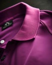 A closeup of a magenta polo shirt with a small logo embroidered on the chest. Trendy color of 2023 Viva Magenta.. AI