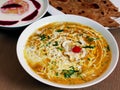 Closeup of Malai Kofta curry served with pineapple raitha and plain paratha