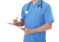 Closeup of male doctor in scrubs with stethoscope and clipboard on white. Medical staff Royalty Free Stock Photo