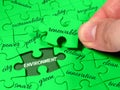 Closeup male hands holding missing jigsaw environment tag cloud green puzzle. Ecology clean energy renewable sustainability Royalty Free Stock Photo