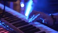 Closeup Of Male Hands Playing Piano. Man Playing The Synthesizer Keyboard. Man Plays Music Keyboard. Musician Plays