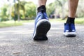 Closeup of male running walking shoes. Work out concept, step walk