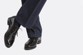 Closeup of Male's Stylish Oxfrod Brogue Shoes Posing with Legs C