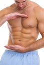 Closeup on male showing great abdominal muscles Royalty Free Stock Photo