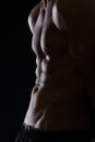 Closeup on male torso with abdominal muscles Royalty Free Stock Photo