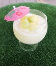 Closeup of malon juice in white glass on the table