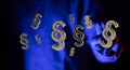 Closeup of a man clicking on 3d rendering of silver paragraph symbols in neon blue light