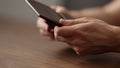 closeup man counting money in brown leather wallet Royalty Free Stock Photo