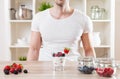 Closeup on man with delicious yoghurt with fresh berries Royalty Free Stock Photo