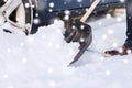 Closeup of man digging snow with shovel near car Royalty Free Stock Photo