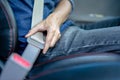 Closeup of man fastening seat belt in car, Safety belt safety first