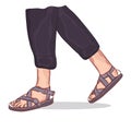 Closeup man feet wearing black sandals with string laces