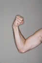 Closeup Of Man Flexing Biceps Royalty Free Stock Photo