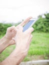Closeup of man hand using a smart phone Royalty Free Stock Photo
