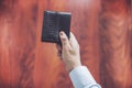 Closeup of man hands, man holds out wallet in hand Royalty Free Stock Photo