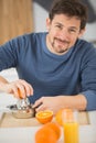 closeup on man making orange juice Royalty Free Stock Photo