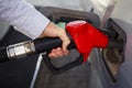 Closeup of man pumping gasoline fuel in car at gas station. fuel car at gas station. Pumping gas at gas pump Royalty Free Stock Photo