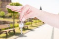 Closeup of man realtor showing apartment key