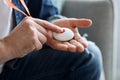 Closeup Of Man's Hand Pressing Alarm Button For Emergency