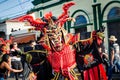 Closeup man in scary samurai warrior costume poses for photo at dominican carnival