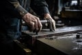 Closeup of a man working on a lathe machine. An industrial workers hands close up of working in project, AI Generated Royalty Free Stock Photo