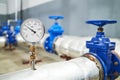 Manometer pipes and valve in water pump station Royalty Free Stock Photo