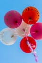 Many bright baloons in the blue sky Royalty Free Stock Photo