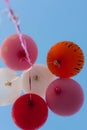 Many bright baloons in the blue sky Royalty Free Stock Photo