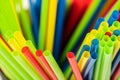 Closeup of many different disordered colored straws