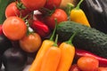 closeup of many fresh organic vegetables of various colors