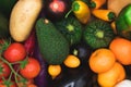 closeup of many fresh organic vegetables of various colors