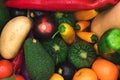 closeup of many fresh organic vegetables of various colors