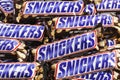 Closeup of many Snickers chocolate bars