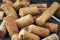 A closeup of many wine corks and a classic corkscrew Royalty Free Stock Photo