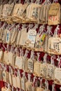 Closeup of many wooden wishing cards